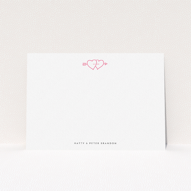 A couples correspondence card named "Through the hearts". It is an A5 card in a landscape orientation. "Through the hearts" is available as a flat card, with tones of white and pink.