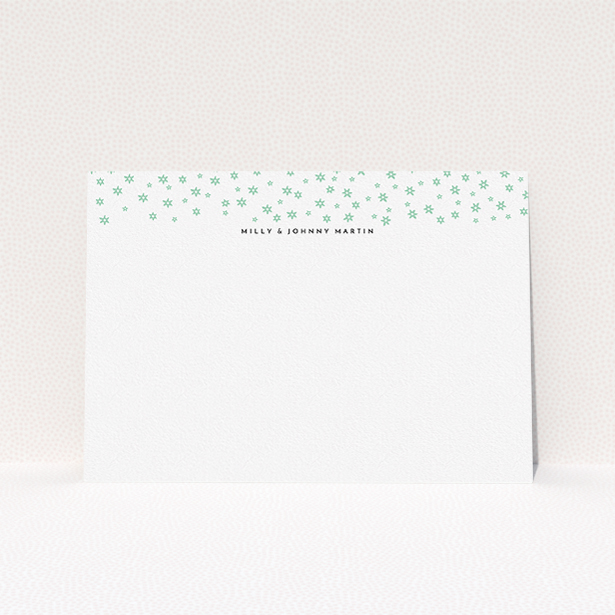 A couples custom writing stationery design titled "Stars at night". It is an A5 card in a landscape orientation. "Stars at night" is available as a flat card, with tones of white and green.