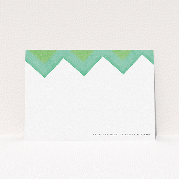 A couples custom writing stationery design named "Vibrant Peaks". It is an A5 card in a landscape orientation. "Vibrant Peaks" is available as a flat card, with tones of green and white.