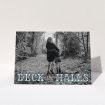 A custom christmas card named "Deck the Halls". It is an A5 card in a landscape orientation. It is a photographic custom christmas card with room for 1 photo. "Deck the Halls" is available as a folded card, with tones of blue and beige.