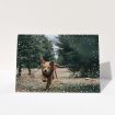A custom christmas card design titled "Simple Snow Photo". It is an A5 card in a landscape orientation. It is a photographic custom christmas card with room for 1 photo. "Simple Snow Photo" is available as a folded card, with mainly white colouring.