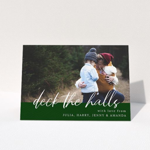 Family Christmas Card Design - "Forrest Green Feelings" A family christmas card called "Forrest Green Feelings". It is an A5 card in a landscape orientation. It is a photographic family christmas card with room for 1 photo. "Forrest Green Feelings" is available as a folded card, with mainly green colouring.