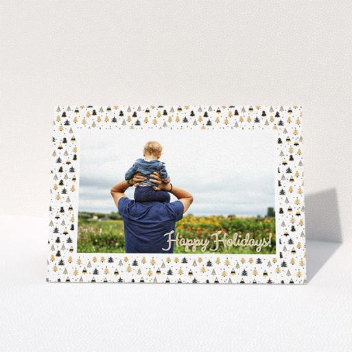 Family Christmas Card Design - "Golden Winter Forrest" A family christmas card named "Golden Winter Forrest". It is an A6 card in a landscape orientation. It is a photographic family christmas card with room for 1 photo. "Golden Winter Forrest" is available as a folded card, with tones of white, gold and black.