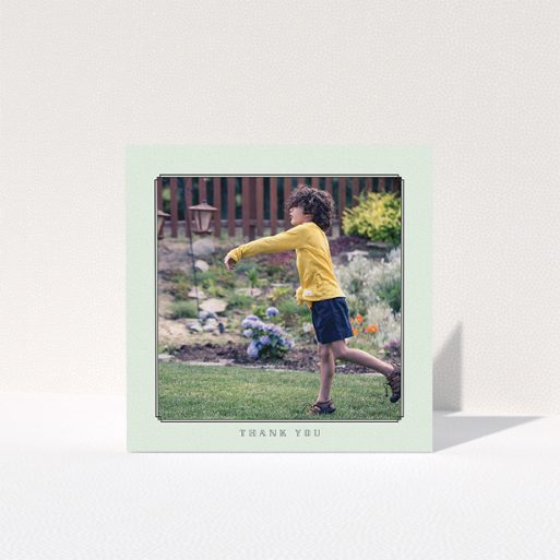 First Holy Communion Thank You Card Design - "Mint Deco" A first holy communion thank you card template titled "Mint Deco". It is a square (148mm x 148mm) card in a square orientation. It is a photographic first holy communion thank you card with room for 1 photo. "Mint Deco" is available as a folded card, with mainly green colouring.