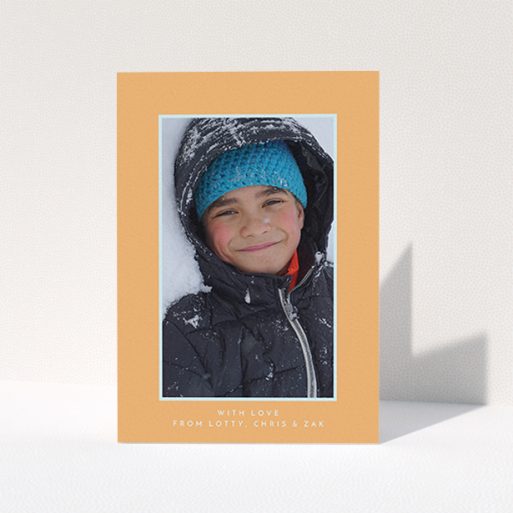 First Holy Communion Thank You Card Design - "Orange and Mint" A first holy communion thank you card named "Orange and Mint". It is an A6 card in a portrait orientation. It is a photographic first holy communion thank you card with room for 1 photo. "Orange and Mint" is available as a folded card, with tones of orange and blue.