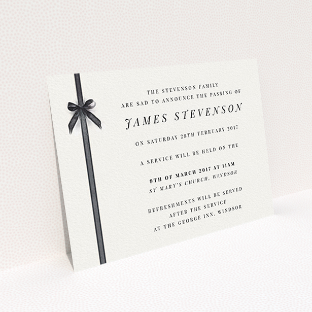 A funeral announcement card named "Gracefully tied". It is an A6 card in a landscape orientation. "Gracefully tied" is available as a flat card, with tones of pale cream and faded black.