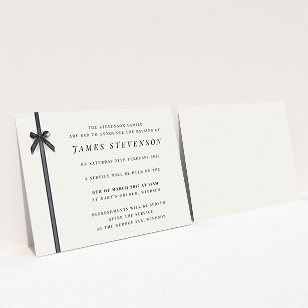 A funeral announcement card named "Gracefully tied". It is an A6 card in a landscape orientation. "Gracefully tied" is available as a flat card, with tones of pale cream and faded black.