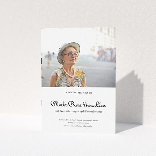 Funeral Order of Service Design - "Simple Elegance" A funeral order of service named "Simple Elegance. It is an A5 booklet in a portrait orientation. It is a photographic funeral order of service with room for 1 photo. "Simple Elegance" is available as a folded booklet booklet, with tones of white and black.