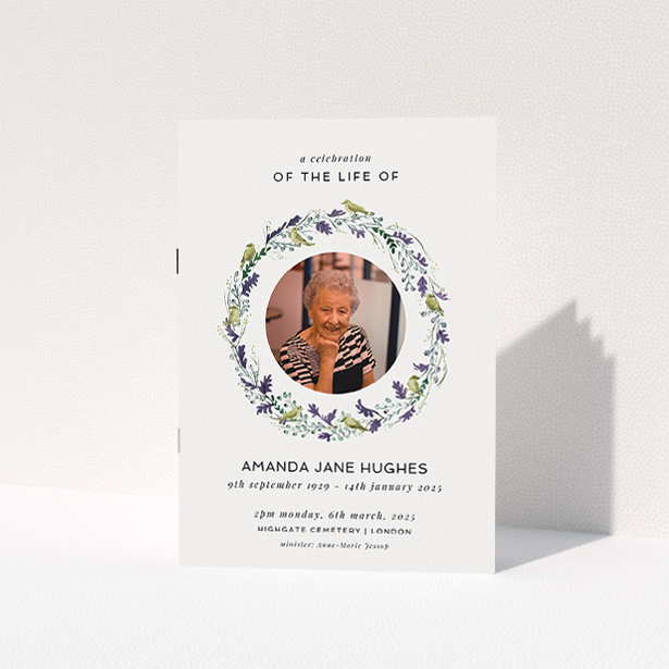 A funeral order of service named "Bird wreath. It is an A5 booklet in a portrait orientation. It is a photographic funeral order of service with room for 1 photo. "Bird wreath" is available as a folded booklet booklet, with tones of green and purple.