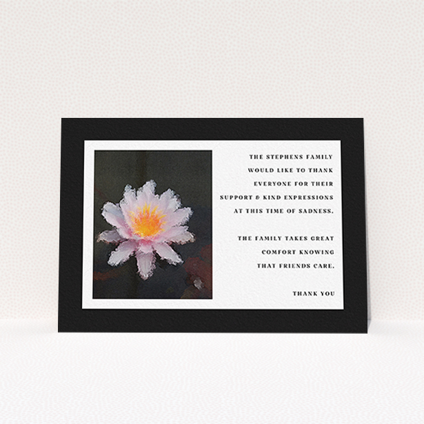 A funeral thank you card design called "A Single Water Lily". It is an A6 card in a landscape orientation. "A Single Water Lily" is available as a flat card, with tones of black and white.