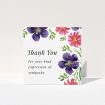 A funeral thank you card design called "Flowers encroaching". It is a square (148mm x 148mm) card in a square orientation. "Flowers encroaching" is available as a folded card, with tones of white and dark purple.