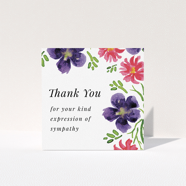 A funeral thank you card design called "Flowers encroaching". It is a square (148mm x 148mm) card in a square orientation. "Flowers encroaching" is available as a folded card, with tones of white and dark purple.