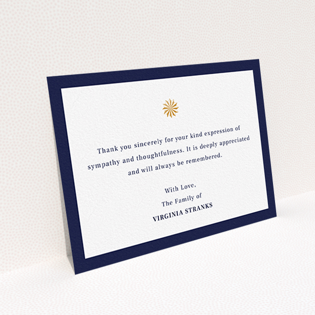 A funeral thank you card named "Golden sundial". It is an A6 card in a landscape orientation. "Golden sundial" is available as a flat card, with tones of navy blue and white.