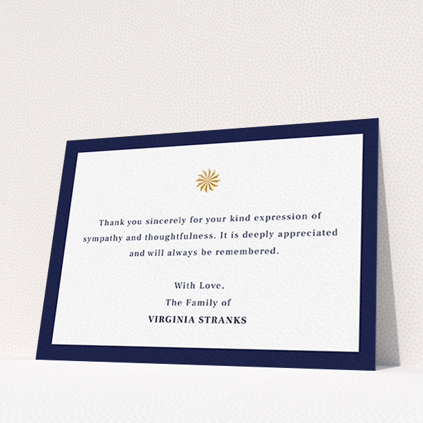 A funeral thank you card named "Golden sundial". It is an A6 card in a landscape orientation. "Golden sundial" is available as a flat card, with tones of navy blue and white.
