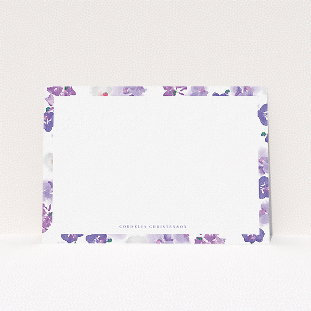 A ladies custom writing stationery design called "Violet Scatter". It is an A5 card in a landscape orientation. "Violet Scatter" is available as a flat card, with mainly purple/dark pink colouring.
