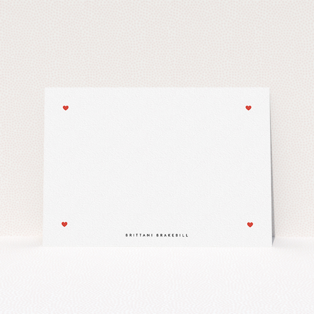 A ladies personalised note card named "All the hearts". It is an A5 card in a landscape orientation. "All the hearts" is available as a flat card, with tones of white and red.