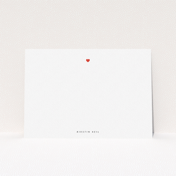 A ladies personalised note card called "Just one heart". It is an A5 card in a landscape orientation. "Just one heart" is available as a flat card, with tones of white and red.