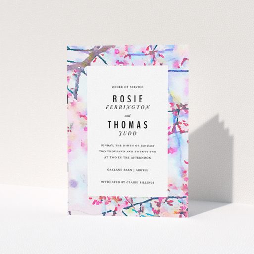 Multi-page Wedding Order of Service Design - "Pink Blossom Cover" A multipage wedding order of service named "Pink Blossom Cover". It is an A5 booklet in a portrait orientation. "Pink Blossom Cover" is available as a folded booklet booklet, with tones of light blue, light pink and brown.