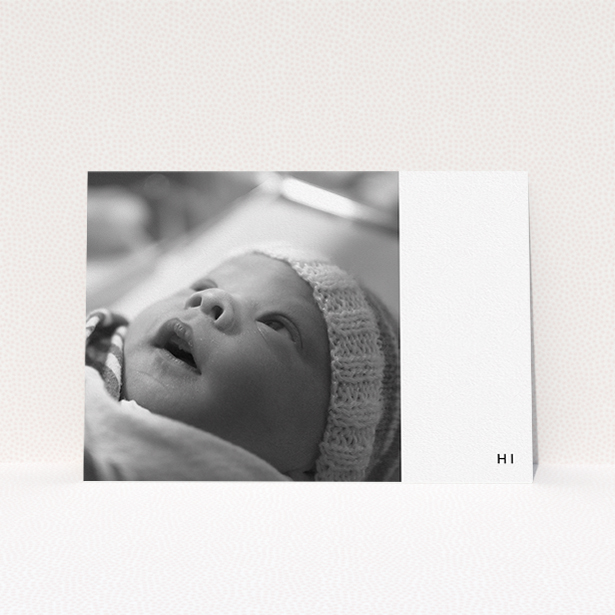 A new baby announcement card design titled "HI". It is an A5 card in a landscape orientation. It is a photographic new baby announcement card with room for 1 photo. "HI" is available as a flat card, with tones of black and white.