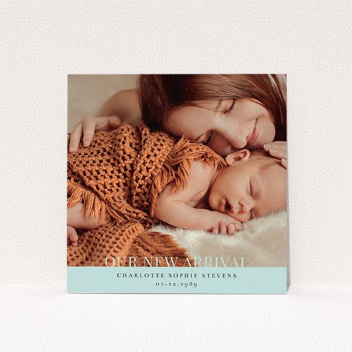 New Baby Announcement Card Design - "Our New Arrival" A new baby announcement card named "Our New Arrival". It is a square (148mm x 148mm) card in a square orientation. It is a photographic new baby announcement card with room for 1 photo. "Our New Arrival" is available as a flat card, with mainly blue colouring.