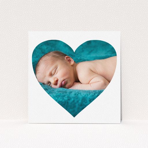 New Baby Announcement Card Design - "Simple Heart Frame" A new baby announcement card design titled "Simple Heart Frame". It is a square (148mm x 148mm) card in a square orientation. It is a photographic new baby announcement card with room for 1 photo. "Simple Heart Frame" is available as a flat card, with mainly white colouring.
