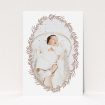A new baby announcement card design titled "Tussled Wreath". It is an A6 card in a portrait orientation. It is a photographic new baby announcement card with room for 1 photo. "Tussled Wreath" is available as a flat card, with tones of pink and white.