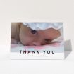 A new baby thank you card named "Cross Border". It is an A6 card in a landscape orientation. It is a photographic new baby thank you card with room for 1 photo. "Cross Border" is available as a folded card, with mainly white colouring.