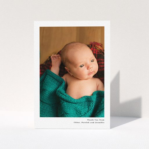 New Baby Thank You Card Design - "Simple Portrait" A new baby thank you card design named "Simple Portrait". It is an A6 card in a portrait orientation. It is a photographic new baby thank you card with room for 1 photo. "Simple Portrait" is available as a folded card, with mainly white colouring.