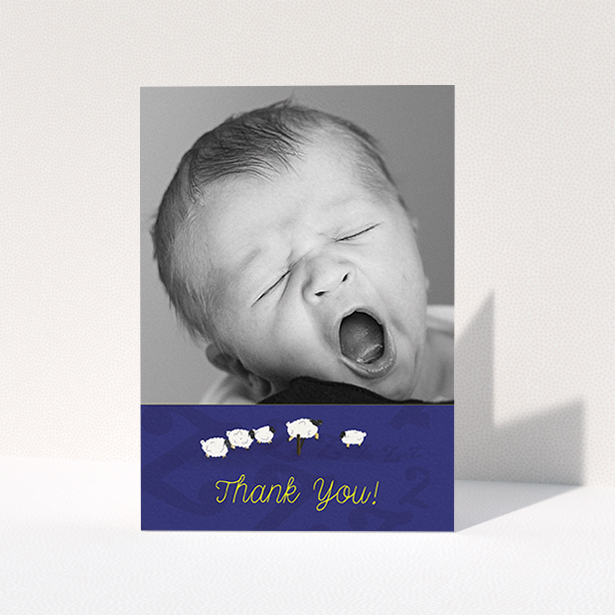 A new baby thank you card called "Sleepy Time". It is an A6 card in a portrait orientation. It is a photographic new baby thank you card with room for 1 photo. "Sleepy Time" is available as a folded card, with tones of navy blue and white.