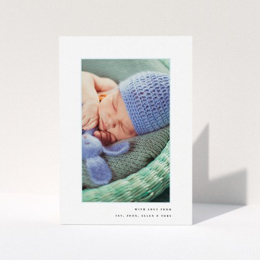 New Baby Thank You Card Design - "Thin Blue Frame" A new baby thank you card design titled "Thin Blue Frame". It is an A5 card in a portrait orientation. It is a photographic new baby thank you card with room for 1 photo. "Thin Blue Frame" is available as a folded card, with tones of white and blue.