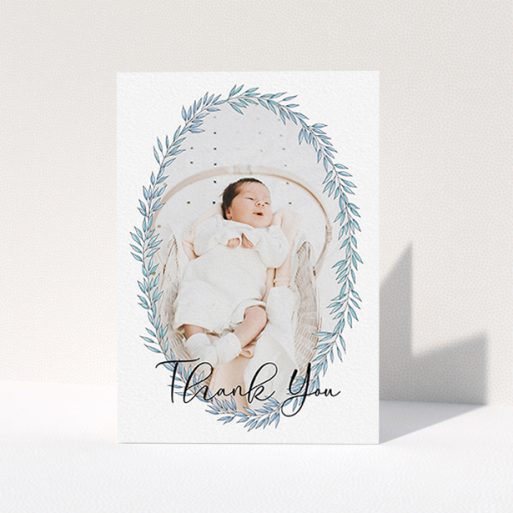 Thank You Card - Tussled Wreath (Baby Boy) A new baby thank you card called "Tussled Wreath". It is an A6 card in a portrait orientation. It is a photographic new baby thank you card with room for 1 photo. "Tussled Wreath" is available as a folded card, with tones of blue and white.