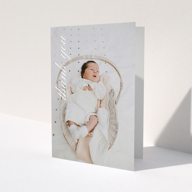 A new baby thank you card design called "Up the Side". It is an A5 card in a portrait orientation. It is a photographic new baby thank you card with room for 1 photo. "Up the Side" is available as a folded card, with mainly white colouring.