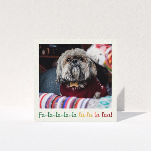 Personalised Christmas Card Design - "Choral" A personalised christmas card named "Choral". It is a square (148mm x 148mm) card in a square orientation. It is a photographic personalised christmas card with room for 1 photo. "Choral" is available as a folded card, with tones of light cream and red.