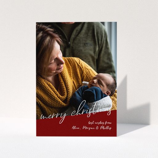 Personalised Christmas Card Design - "Ski Slope" A personalised christmas card design called "Ski Slope". It is an A6 card in a portrait orientation. It is a photographic personalised christmas card with room for 1 photo. "Ski Slope" is available as a folded card, with tones of burgundy and white.