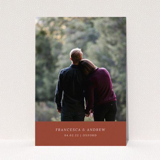 Personalised Wedding Invitation Design - "Autumnal Photo" A personalised wedding invitation named "Autumnal Photo". It is an A5 invite in a portrait orientation. It is a photographic personalised wedding invitation with room for 1 photo. "Autumnal Photo" is available as a flat invite, with mainly dark orange colouring.