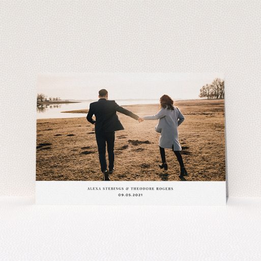 Personalised Wedding Invitation Design - "Duke of York Square" A personalised wedding invitation design called "Duke of York Square". It is an A5 invite in a landscape orientation. It is a photographic personalised wedding invitation with room for 1 photo. "Duke of York Square" is available as a flat invite, with mainly white colouring.