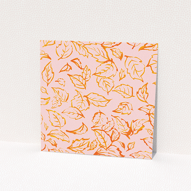 A personalised wedding invitation named "Falling Foliage". It is a square (148mm x 148mm) invite in a square orientation. "Falling Foliage" is available as a flat invite, with tones of pink and orange.