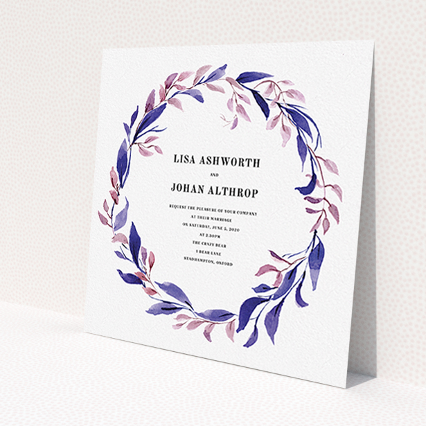A personalised wedding invitation template titled "Hues of Blue". It is a square (148mm x 148mm) invite in a square orientation. "Hues of Blue" is available as a flat invite, with tones of dark pink and purple.