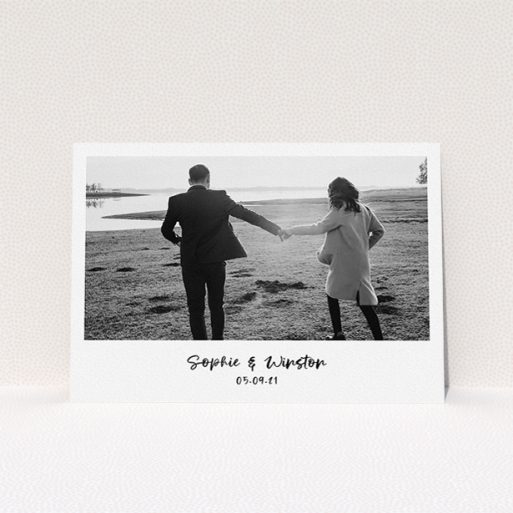 Personalised Wedding Invitation Design - "Monochrome Photo" A personalised wedding invitation called "Monochrome Photo". It is an A5 invite in a landscape orientation. It is a photographic personalised wedding invitation with room for 1 photo. "Monochrome Photo" is available as a flat invite, with mainly white colouring.