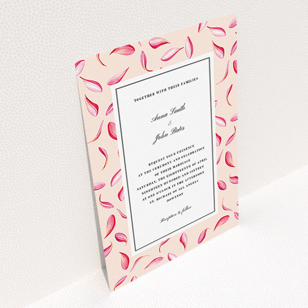 A personalised wedding invitation design called "Petal avalanche". It is an A5 invite in a portrait orientation. "Petal avalanche" is available as a flat invite, with tones of pink, red and white.