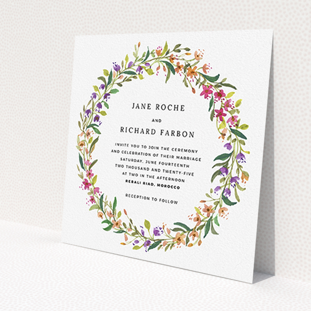 A personalised wedding invitation named "Spring Florist". It is a square (148mm x 148mm) invite in a square orientation. "Spring Florist" is available as a flat invite, with tones of light green and orange.