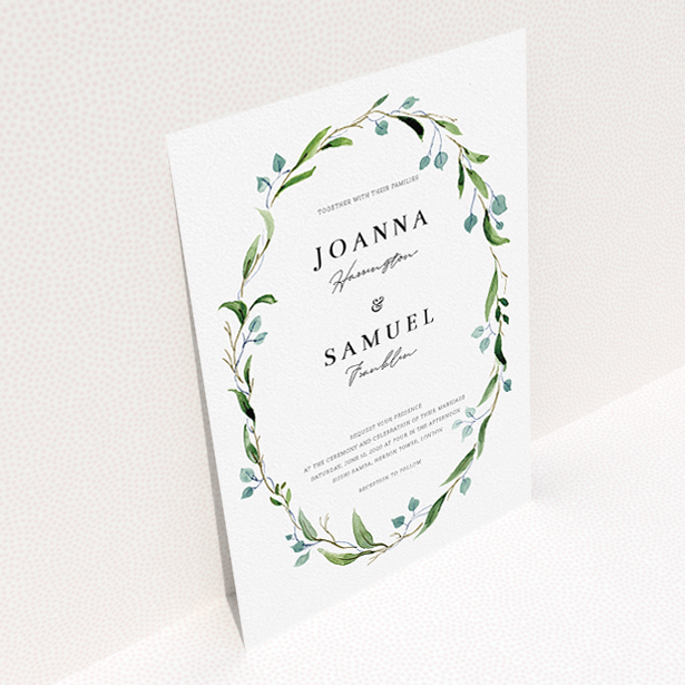 A personalised wedding invitation named "Thin Watercolour Wreath". It is an A5 invite in a portrait orientation. "Thin Watercolour Wreath" is available as a flat invite, with tones of blue and green.