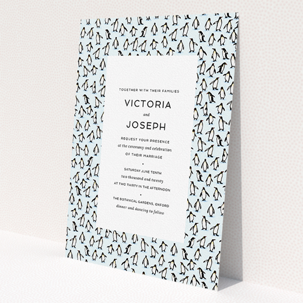A personalised wedding invitation called "Tiny, Tiny Penguins". It is an A5 invite in a portrait orientation. "Tiny, Tiny Penguins" is available as a flat invite, with tones of blue and white.