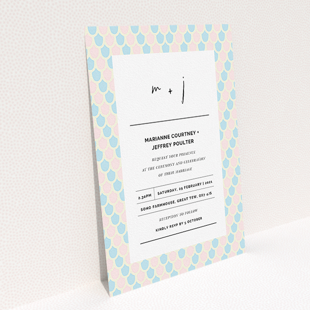 A personalised wedding invitation named "Worn Tiles". It is an A5 invite in a portrait orientation. "Worn Tiles" is available as a flat invite, with tones of pink, blue and cream.