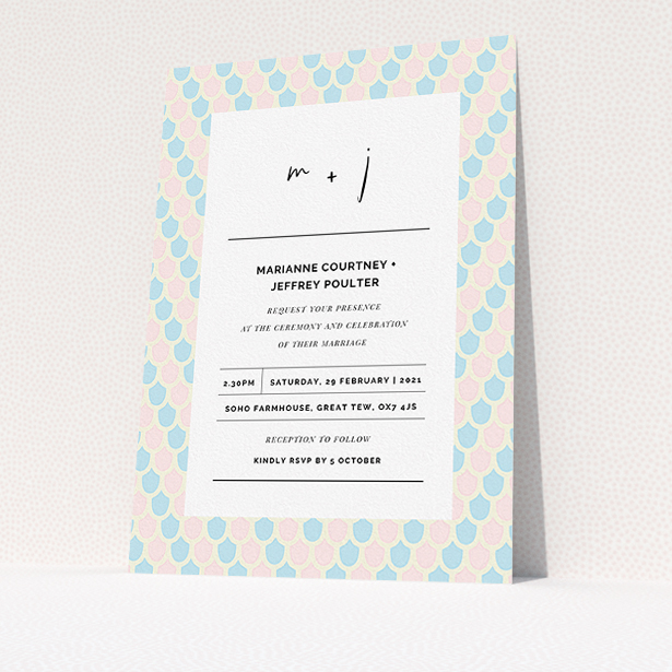 A personalised wedding invitation named "Worn Tiles". It is an A5 invite in a portrait orientation. "Worn Tiles" is available as a flat invite, with tones of pink, blue and cream.