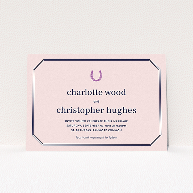 A personalised wedding invite template titled "Lucky horse shoe". It is an A5 invite in a landscape orientation. "Lucky horse shoe" is available as a flat invite, with mainly pink colouring.