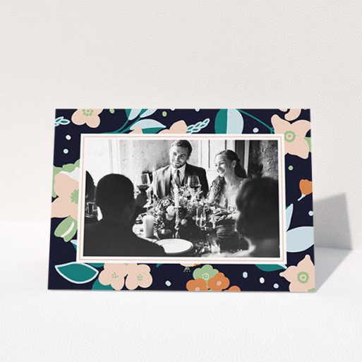 Photo Wedding Thank You Card Design - "Midnight Garden Photo Frame" A photo wedding thank you card template titled "Midnight Garden Photo Frame". It is an A6 card in a landscape orientation. It is a photographic photo wedding thank you card with room for 1 photo. "Midnight Garden Photo Frame" is available as a folded card, with tones of navy blue, pink and orange.