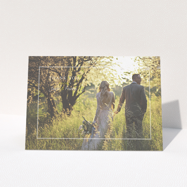 A photo wedding thank you card called "Not even there". It is an A5 card in a landscape orientation. It is a photographic photo wedding thank you card with room for 1 photo. "Not even there" is available as a folded card, with mainly white colouring.