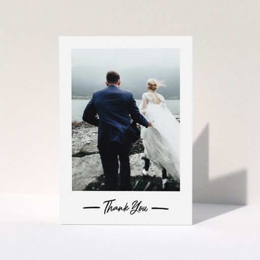 Photo Wedding Thank You Card Design - "Portrait Thank You Photo" A photo wedding thank you card called "Portrait Thank You Photo". It is an A5 card in a portrait orientation. It is a photographic photo wedding thank you card with room for 1 photo. "Portrait Thank You Photo" is available as a folded card, with mainly white colouring.