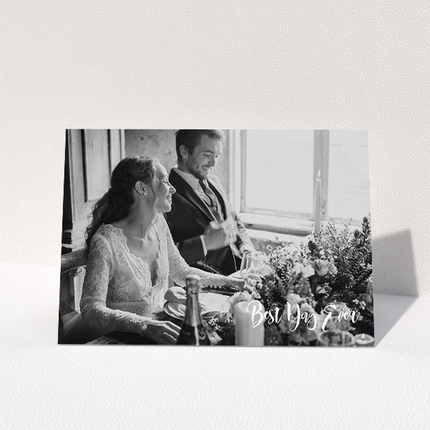 A photo wedding thank you card design titled "Truly It Was". It is an A5 card in a landscape orientation. It is a photographic photo wedding thank you card with room for 1 photo. "Truly It Was" is available as a folded card, with mainly white colouring.